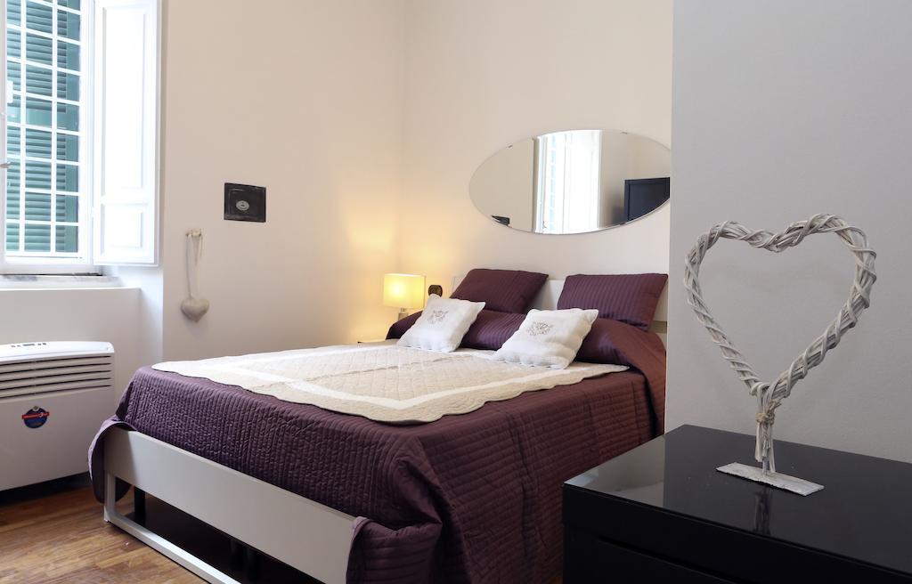 רומא Caracciolo Guest House חדר תמונה